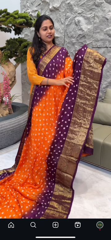 Orange with purple bhandini saree