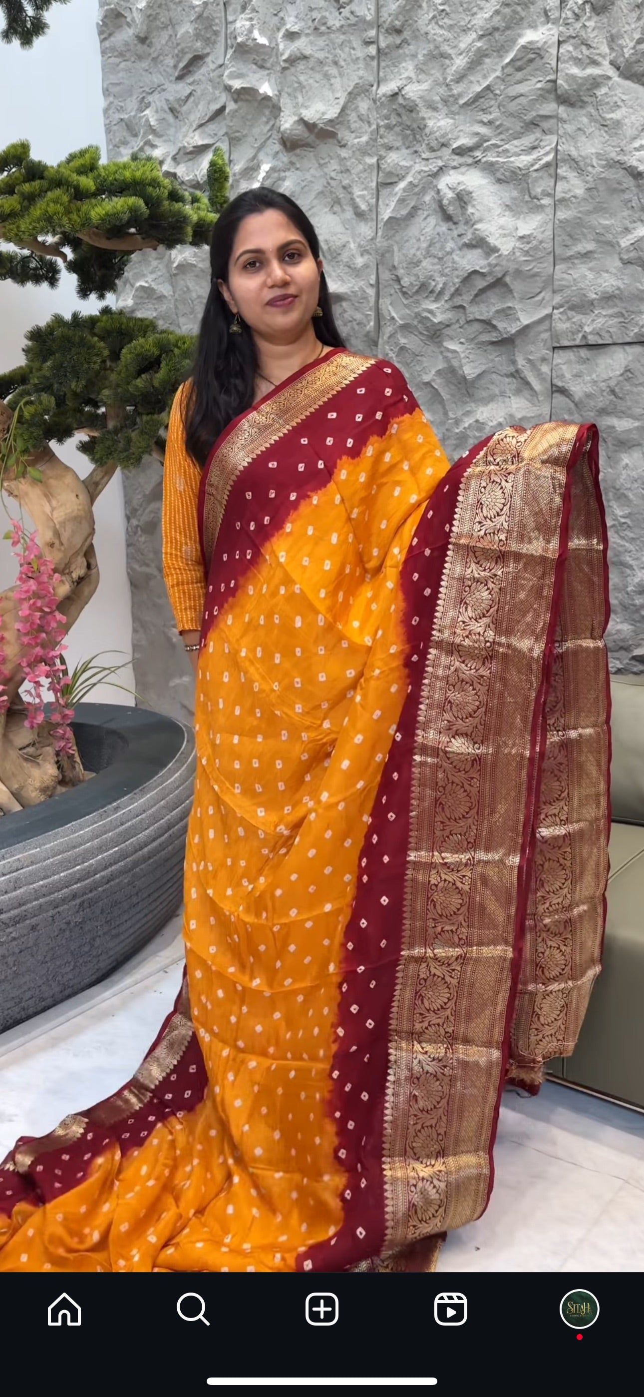 Yellowish orange with maroon bhandini saree